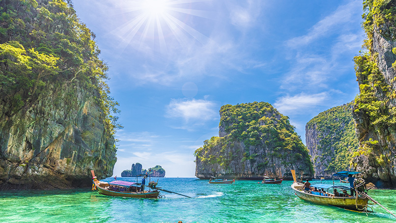 Turquoise lagoon ringed by limestone cliffs